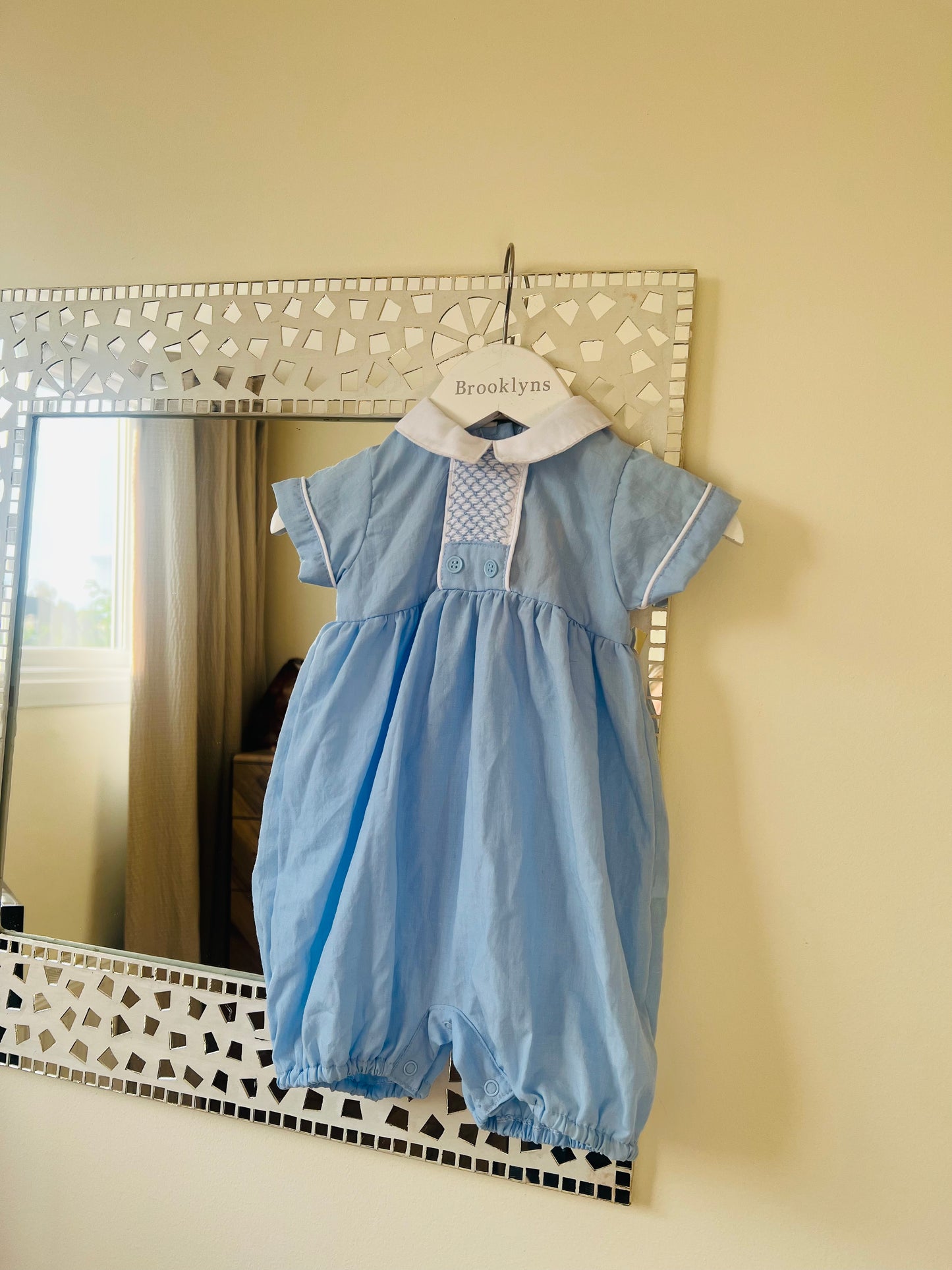 Blue smocked romper